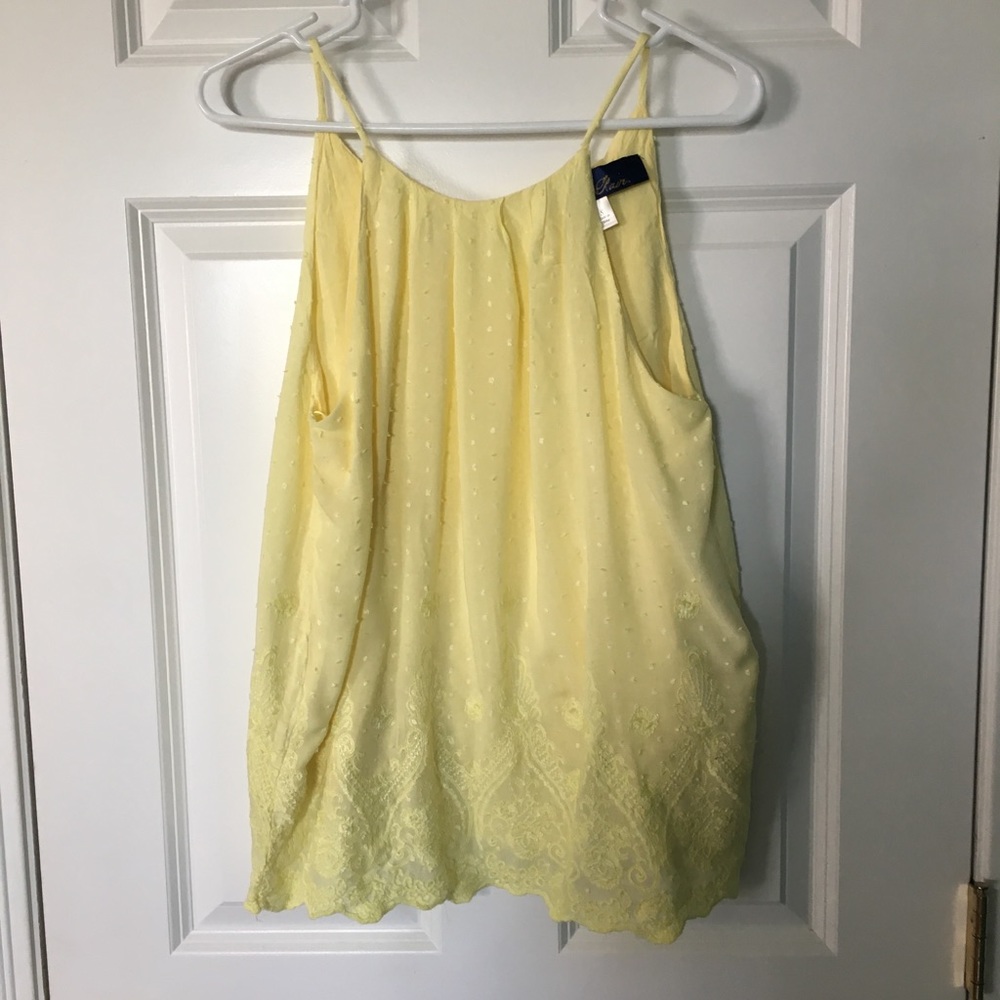 Francesca’s yellow tank top